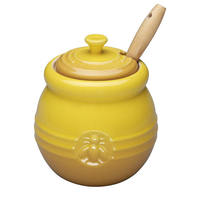 Pot de miel en céramique jaune avec louche pour le stockage des aliments et l'usine de conteneurs en gros 500ml