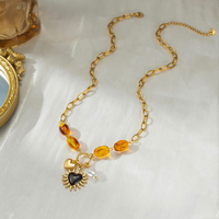 Collier en acier inoxydable avec perles de résine ambrée, breloque cœur noir soleil, fausse perle, fermoir OT plaqué or 18 carats, bijoux inaltérables