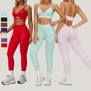 ملابس رياضية نسائية، أطقم يوجا، ملابس رياضية عالية الخصر بدون خياطة للصالة الرياضية واللياقة البدنية، طقم رياضي من قطعتين سريع الجفاف من النايلون والسباندكس مع شعار مخصص - Product Image 1