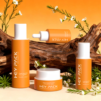 Ensemble d'emballages cosmétiques OEM, flacon pompe pour lotion orange 50 ml 120 ml, flacon compte-gouttes pour sérum 30 ml, pot pour crème pour le visage 50 g