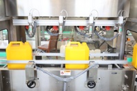 Machine automatique de remplissage, pesage et bouchage pour bidons de 5L, 10L, 20L, 25L d'huile de palme comestible et de liquides nutritifs pour plantes