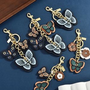 Llavero de mariposa de cuero PU al por mayor con temática de insectos para mujer, dijes para bolso - Product Image 6