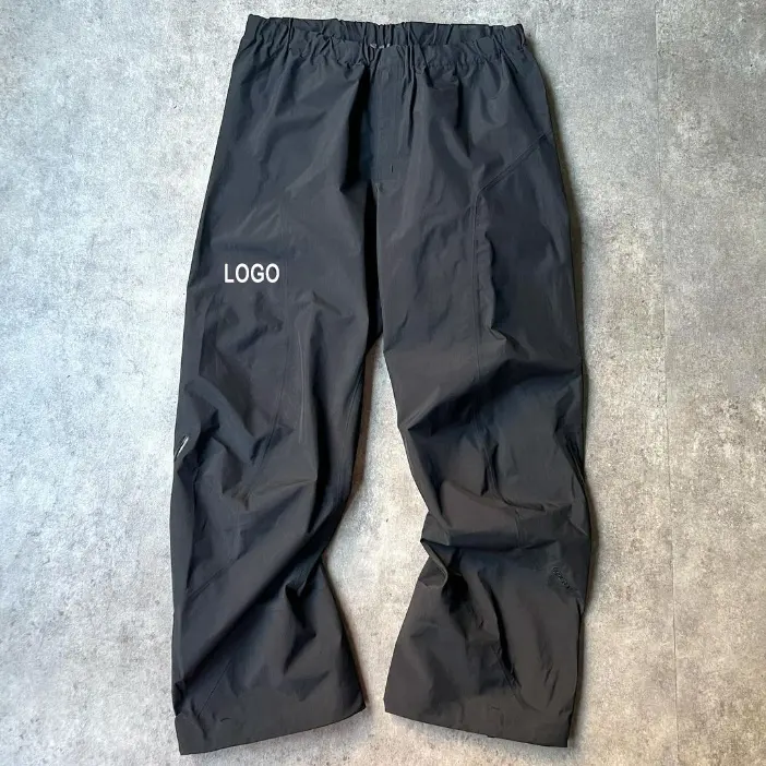 Nieuwe Custom Hoge Kwaliteit Man Zwarte Losse Oversized Rits Open Bodem Baggy Nylon Polyester Trainingsbroek Voor Mannen