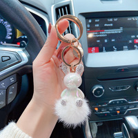 Vente en gros porte-clés lapin coloré pompon pneu électrolytique porte-clés lapin sacs à main breloques porte-clés voiture