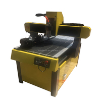 Mini machine de découpe CNC 6090 pour le bois / Petite machine de découpe de modèles en pierre 6090 avec réservoir d'eau
