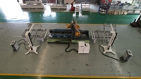 Scie à panneaux de porte CNC automatique à quatre bords avec contrôle intelligent pour le traitement des panneaux de meubles en bois