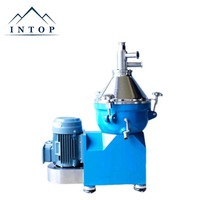 Petite centrifugeuse à disques pour la séparation du lait écrémé, avec capacité de séparation en deux phases