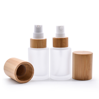 Botol Losion kaca tutup bambu kualitas tinggi 30ml 2oz botol semprot buram bening minyak esensial