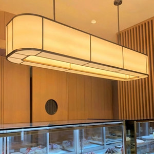Lustre ovale moderne en tissu LED à six têtes pour restaurant, hôtel, bar, comptoir, lampe décorative pour la maison - Product Image 1