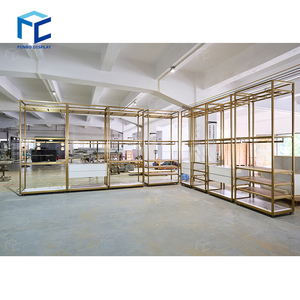 Thiết kế hiện đại kim loại vàng sáng bóng bán lẻ hàng may mặc hiển thị Kệ vàng quần áo hiển thị kệ cho quần áo cửa hàng trang trí - Product Image 1