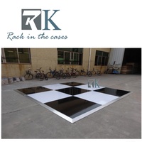 Piste de danse blanche et noire pour mariages et fêtes en promotion