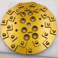 Disque abrasif diamanté PCD de 10 pouces (250 mm) haute dureté pour l'élimination de la résine époxy et des revêtements anciens sur sols en béton - Vente en gros usine