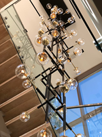 Lustre LED moderne en métal et verre pour escalier, hall d'entrée, réception, salle d'exposition, villa de luxe