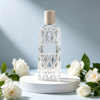 Flacon pulvérisateur de parfum en verre transparent en gros, 100 ml, forme cylindrique, distributeur cosmétique vide
