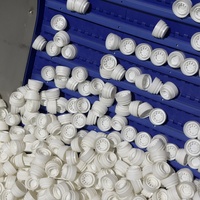 Machine d'assemblage en deux parties pour bouchons de bouteilles d'huile de tournesol et moule d'injection pour l'emballage d'huiles comestibles et d'huile d'olive