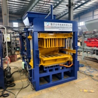 Équipement de formage de briques en béton QT4-15B pour la production de blocs creux et pleins