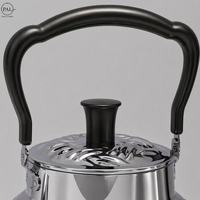 Bouilloire en acier inoxydable à motif tressé en relief, finition miroir, poignée noire, bouton noir, bec élégant pour la cuisine domestique et la préparation du thé