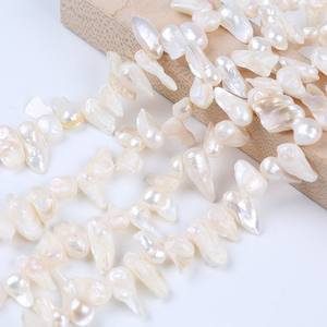 Vente directe de Zhuji, perles naturelles de forme baroque de 7 à 10 mm, perles en vrac avec queue en coquille, provenant de fermes d'élevage - Product Image 1