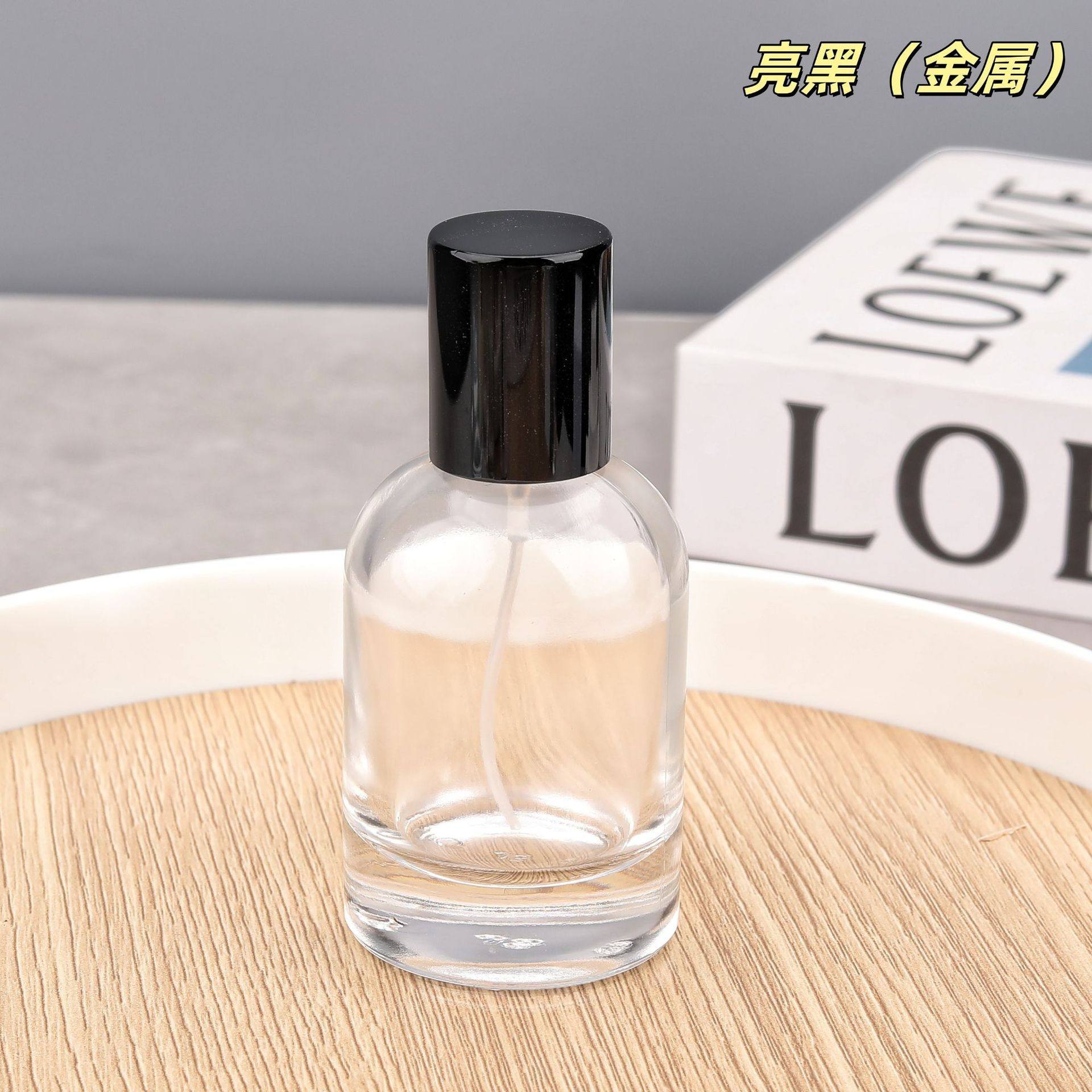 Bouteille transparente + pulvérisateur noir + couvercle noir brillant