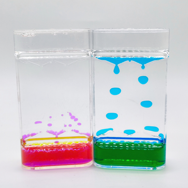 OEM Learning Tool Stress Relief Colorful Liquid Motion Timer Wholesale Two-color Liquid Oil Leaking Hourglass Timer