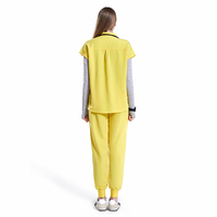 Vente en gros UK Entrepôt Expédition rapide Costumes de gommage OEM ODM Uniforme d'infirmière mondiale Uniforme médical Dames Pantalon de jogging Ensembles de gommage