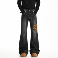 Jean délavé style américain haut de gamme, coupe micro-évasée et jambe large, design unisexe, pantalon slim