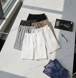 Shorts de sport d'été pour hommes, coupe ample, tissu en coton respirant, design grande taille, parfaits pour les occasions décontractées. - Product Image 1