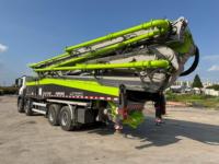 Pompe à béton Zoomlion 63m reconditionnée, moteur diesel 2021, système hydraulique de haute qualité, en stock, prête à être expédiée