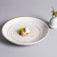 Plat chaud personnalisé en spirale à pois noirs pour assiette en céramique à motifs de restaurants avec motif végétal