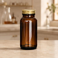 Bouteille personnalisée en verre ambré pour suppléments de collagène avec bouchon métallique doré et étiquette imprimée pour capsules – Emballage OEM