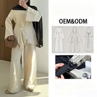 Ensemble deux pièces OEM uni et sobre pour femme musulmane, avec haut asymétrique à manches évasées et pantalon large, tenue quotidienne