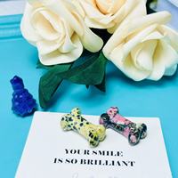 Vente en gros de sculptures en cristal de quartz rose en forme d'os de chien miniature, en pierre naturelle et matériaux mixtes, pour pendentifs DIY