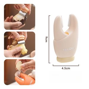 Outil de cuisine domestique 2-en-1 : Éplucheur d'<span class=keywords><strong>ail</strong></span> et grattoir à gingembre, pince à <span class=keywords><strong>ail</strong></span> magnétique pour éplucher et retirer les tiges, avec poignée - Product Image 4