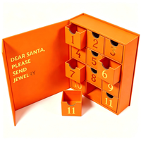 Boîte de calendrier de l'avent de Noël haut de gamme en forme de livre, boîte à bijoux avec 12 tiroirs, impression de numéros en feuille d'or, boîte cadeau en papier rigide
