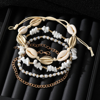 KISSWIFE Chaîne de cheville bohème superposée avec coquillages et perles pour femme, bijou de pied d'été
