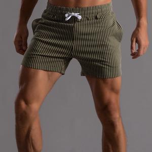 Nouvelles tailles plus shorts de course de bain décontractés solides pour hommes séchage rapide vêtements de plage écologiques basket-ball avec cordon de serrage réglable - Product Image 5
