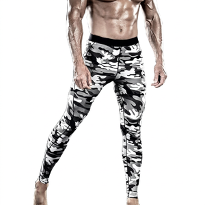 Men's Fitness Leggings Custom Logo Options Solid Color Mid Waist Elastic Seamless Spandex/Nylon Full Length <b>Pants</b> - Product Image 1