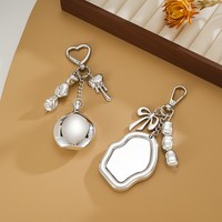 Porte-clés miroir plaqué argent tendance, breloque de sac à main irrégulière, pendentif nœud perlé, miroir de maquillage portable, cadeau pour femme