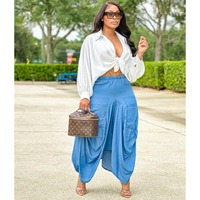 Jupe en jean de coton taille haute asymétrique à ourlet ballon avec grandes poches, style décontracté streetwear, longueur midi pour femme - Collection été 2026 (vente en gros)