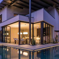 Porte coulissante double vitrage en aluminium isolée, moderne et personnalisée, pour terrasse et jardin extérieur