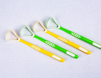 Vente en gros de grattoir pour langue en silicone en plastique