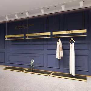 Logotipo personalizado Tienda de lujo Soporte de ropa de <span class=keywords><strong>metal</strong></span> Etiqueta Estante de exhibición de ropa Estante de ropa de oro de acero inoxidable para Boutique - Product Image 2
