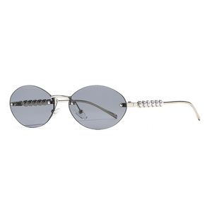 Nuevas gafas de sol sin montura de estilo europeo americano con adornos de perlas, protección UV400 para mujer, montura metálica, lentes negras - Product Image 1