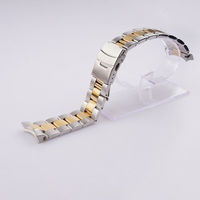 Bracelet de montre-bracelet en acier massif de 22mm avec finition dorée moyenne et caractéristique respirante à extrémité incurvée pour Seiko SKX 007