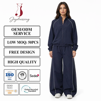 Ensemble deux pièces pour femme Joydressing : veste de survêtement marine zippée et pantalon large avec passepoil contrastant