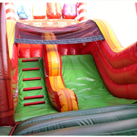 Château gonflable commercial extérieur pour enfants, thème Noël, avec toboggan et luge du Père Noël, combo château rebondissant et toboggan gonflable