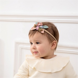 Bandeau en nylon à fleurs pour bébé fille Bandeau élastique doux pour cheveux avec nœud fait main Accessoires pour nouveau-né enfant en bas âge - Product Image 1