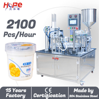 Machine de remplissage, scellage et bouchage rotative à double tête pour yaourt, crème, sauce, confiture et liquides