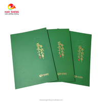 Brochure scolaire personnalisée A5 à grille pointillée, couverture rigide en carton, reliure cousue, vernissage, logo personnalisé, bande élastique, impression offset