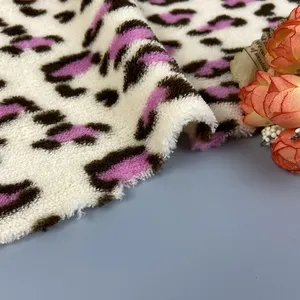 Tela de lana a cuadros de franela coral con estampado de piel sintética de animal leopardo multicolor